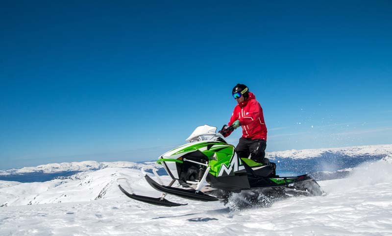 Person riding on a snowmobile